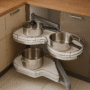 A technical illustration showing dimensions and swing mechanism of the tray